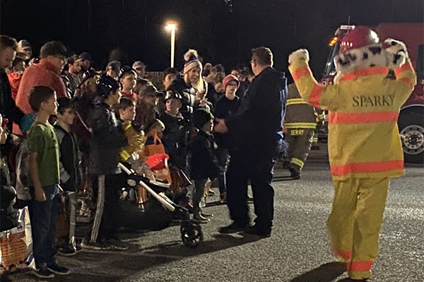 Open House at the Firehall with Sparky the Fire Dog and children cheering